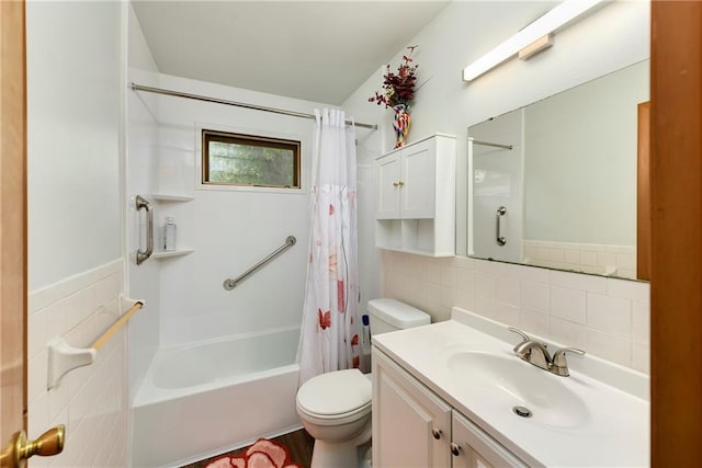 4820 Stearns Ln, Shawnee, KS 66203 - full bath with tile walls, vanity, shower / tub combo, and backsplash