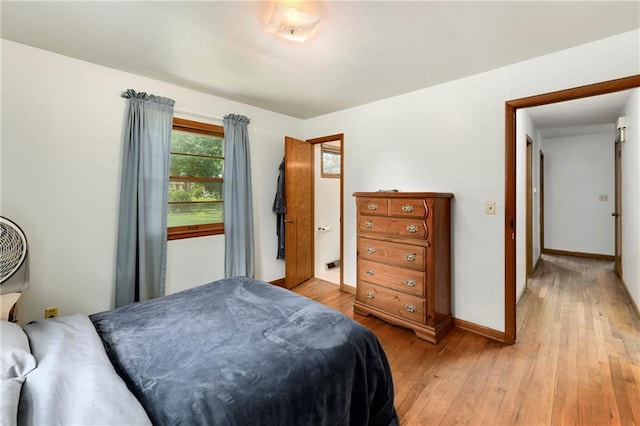 4820 Stearns Ln, Shawnee, KS 66203 - bedroom featuring light wood finished floors and baseboards