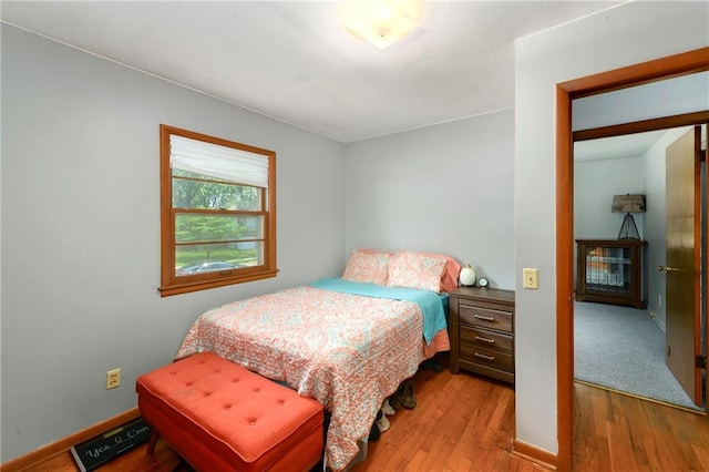 4820 Stearns Ln, Shawnee, KS 66203 - bedroom featuring wood finished floors and baseboards
