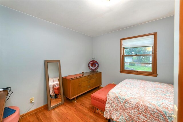 4820 Stearns Ln, Shawnee, KS 66203 - bedroom with light wood-style floors and baseboards