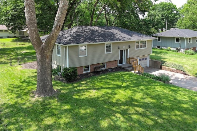 4820 Stearns Ln, Shawnee, KS 66203 - raised ranch with concrete driveway and a garage