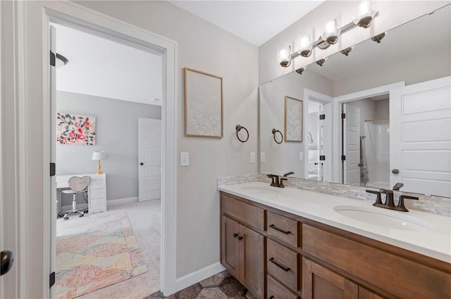 1505 SW Georgetown Dr, Lees Summit, MO 64082 - bathroom with double vanity, baseboards, and a shower