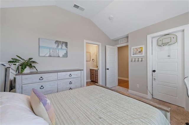 1505 SW Georgetown Dr, Lees Summit, MO 64082 - bedroom featuring vaulted ceiling, carpet, baseboards, and connected bathroom