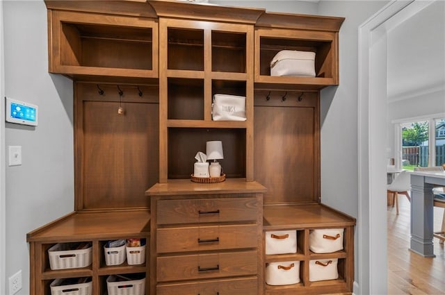 1505 SW Georgetown Dr, Lees Summit, MO 64082 - mudroom with light wood-type flooring and crown molding