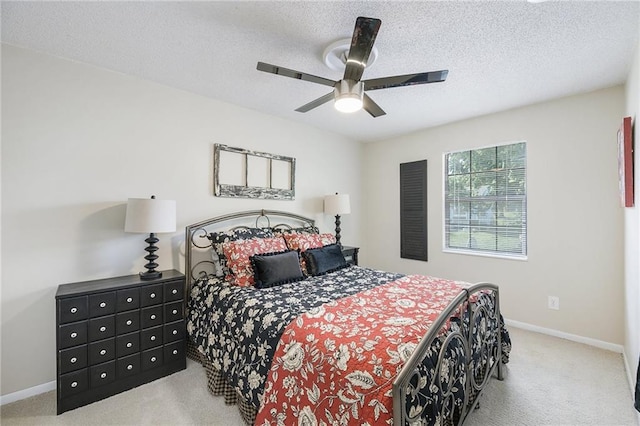 5341 Locust Ln, Kansas City, KS 66106 - bedroom with carpet floors, a textured ceiling, and a ceiling fan