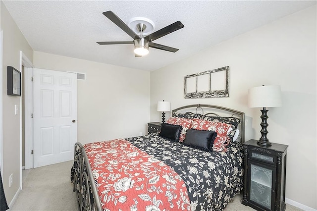5341 Locust Ln, Kansas City, KS 66106 - bedroom featuring carpet flooring, a textured ceiling, and a ceiling fan