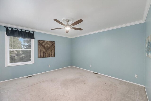 5341 Locust Ln, Kansas City, KS 66106 - carpeted spare room featuring ceiling fan and ornamental molding