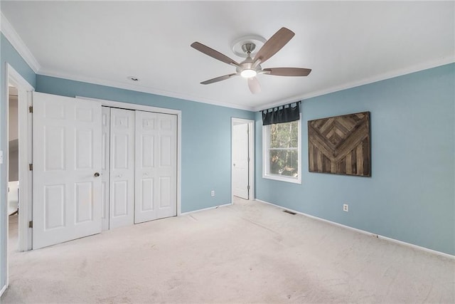 5341 Locust Ln, Kansas City, KS 66106 - unfurnished bedroom featuring crown molding, a closet, carpet floors, and ceiling fan