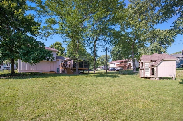 5341 Locust Ln, Kansas City, KS 66106 - view of yard with a wooden deck, stairway, and a shed