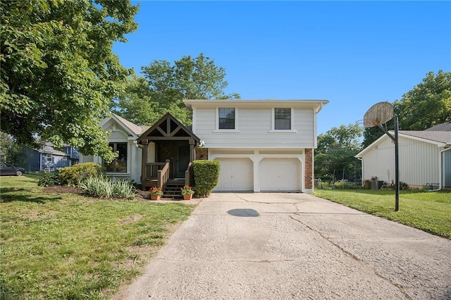 5341 Locust Ln, Kansas City, KS 66106 - view of front of property featuring brick siding, a garage, concrete driveway, and a front yard