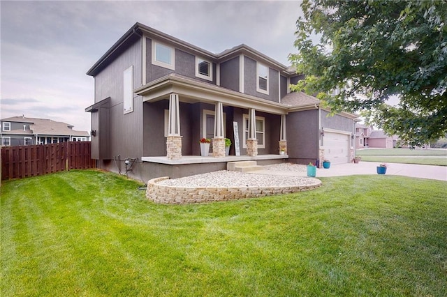 3201 SE 3rd St, Lees Summit, MO 64063 - view of front of house with stucco siding, covered porch, and a garage
