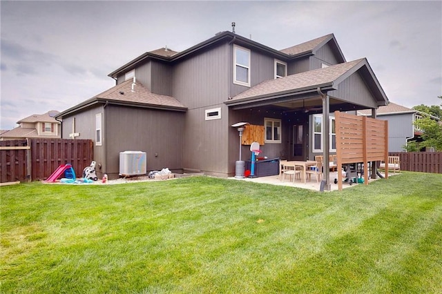 3201 SE 3rd St, Lees Summit, MO 64063 - rear view of house featuring a patio, a fenced backyard, and a shingled roof