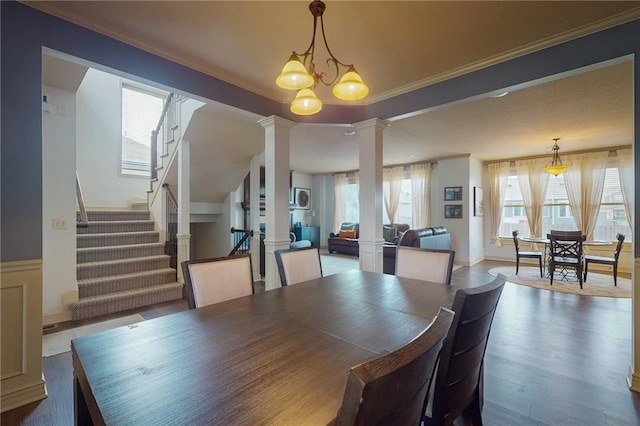 3201 SE 3rd St, Lees Summit, MO 64063 - dining room featuring ornate columns, stairway, ornamental molding, and wood finished floors