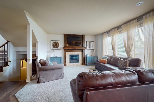3201 SE 3rd St, Lees Summit, MO 64063 - living area with a fireplace, crown molding, wood finished floors, and stairway