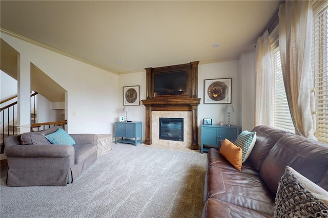 3201 SE 3rd St, Lees Summit, MO 64063 - carpeted living room with a high end fireplace, crown molding, and stairway