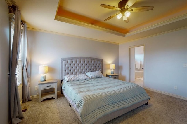 3201 SE 3rd St, Lees Summit, MO 64063 - bedroom with a raised ceiling, light colored carpet, ornamental molding, a ceiling fan, and ensuite bathroom