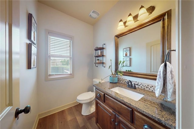 3201 SE 3rd St, Lees Summit, MO 64063 - bathroom with vanity and wood finished floors