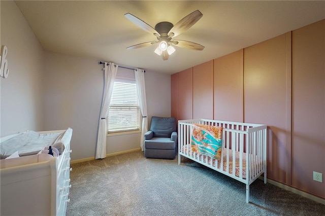 3201 SE 3rd St, Lees Summit, MO 64063 - bedroom with light carpet, a crib, and a ceiling fan