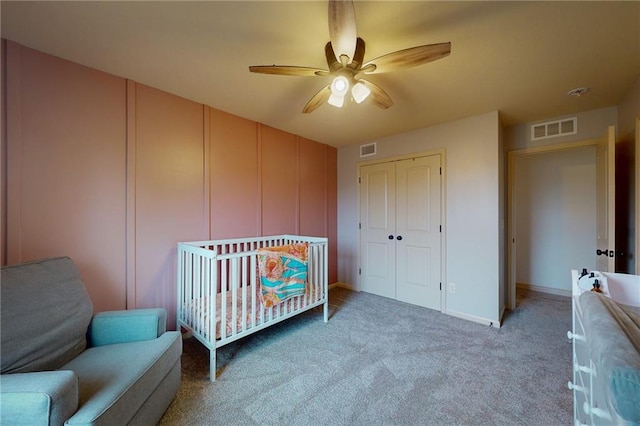 3201 SE 3rd St, Lees Summit, MO 64063 - bedroom with a closet, light carpet, ceiling fan, and a crib