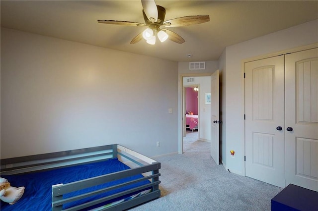 3201 SE 3rd St, Lees Summit, MO 64063 - bedroom featuring carpet flooring, a closet, and a ceiling fan