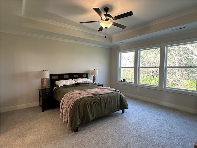 3117 SW Arbor Tree Dr, Lees Summit, MO 64082 - bedroom with a raised ceiling, crown molding, baseboards, light carpet, and ceiling fan