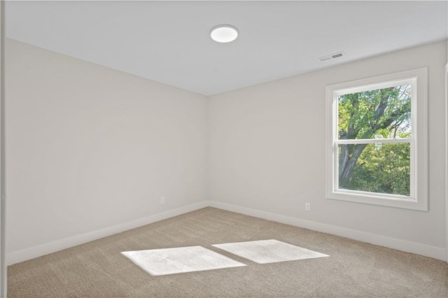 3117 SW Arbor Tree Dr, Lees Summit, MO 64082 - carpeted spare room featuring baseboards