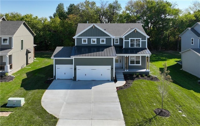 3117 SW Arbor Tree Dr, Lees Summit, MO 64082 - craftsman-style house with driveway, a porch, board and batten siding, a front yard, and a standing seam roof