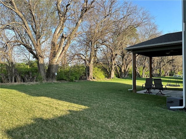 3117 SW Arbor Tree Dr, Lees Summit, MO 64082 - view of green lawn with ceiling fan