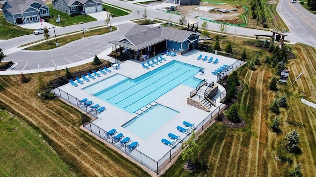 3117 SW Arbor Tree Dr, Lees Summit, MO 64082 - aerial view of property and surrounding area with a pool