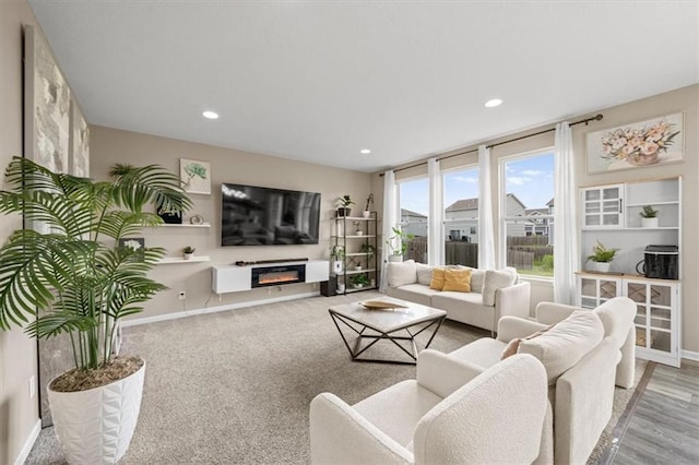 1420 SW Cornwall Rd, Lees Summit, MO 64083 - living area with a glass covered fireplace and recessed lighting