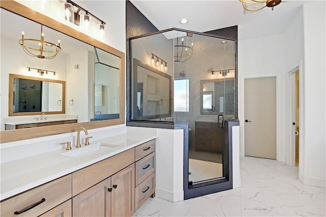 17029 King St, Overland Park, KS 66221 - full bathroom featuring a chandelier, vanity, marble look tile flooring, a shower stall, and recessed lighting