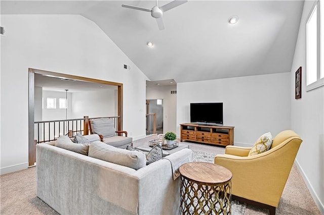 17029 King St, Overland Park, KS 66221 - carpeted living area featuring a ceiling fan, high vaulted ceiling, and baseboards