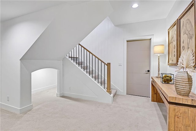 17029 King St, Overland Park, KS 66221 - stairs with carpet floors, baseboards, recessed lighting, and arched walkways