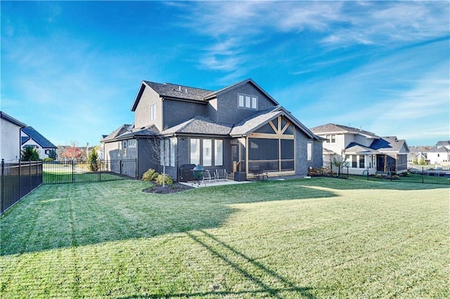 17029 King St, Overland Park, KS 66221 - back of house with a patio area, a residential view, stucco siding, and a sunroom