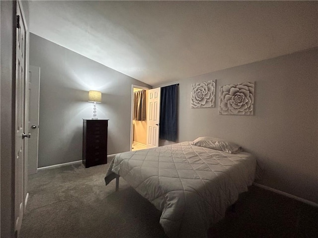 409 N Geronimo Dr, Independence, MO 64056 - carpeted bedroom featuring vaulted ceiling