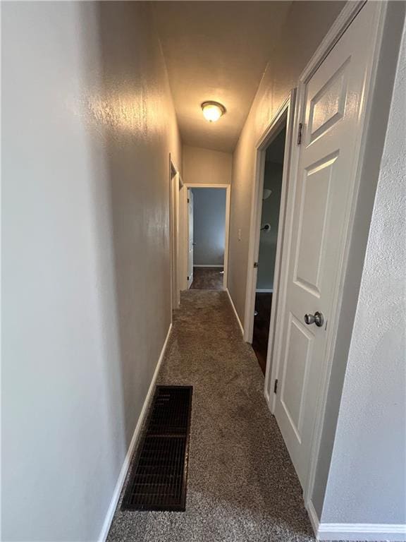 409 N Geronimo Dr, Independence, MO 64056 - hallway with carpet floors and baseboards