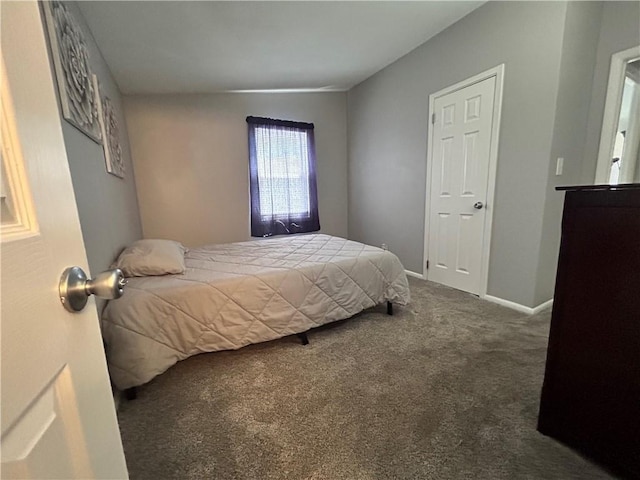 409 N Geronimo Dr, Independence, MO 64056 - carpeted bedroom with baseboards