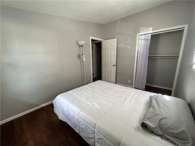 409 N Geronimo Dr, Independence, MO 64056 - bedroom with wood finished floors and a closet