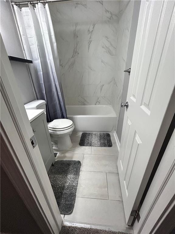 409 N Geronimo Dr, Independence, MO 64056 - full bath featuring shower / bath combo with shower curtain, vanity, and tile patterned flooring