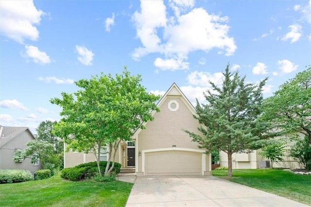 7633 W 148th Ter, Overland Park, KS 66223 - obstructed view of property featuring concrete driveway, a garage, stucco siding, and a front lawn