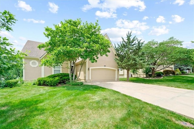 7633 W 148th Ter, Overland Park, KS 66223 - view of property hidden behind natural elements featuring driveway, a front lawn, stucco siding, and a garage