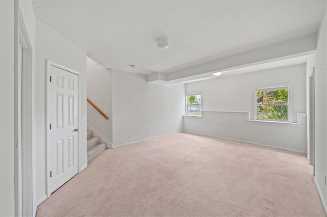 7633 W 148th Ter, Overland Park, KS 66223 - spare room featuring light colored carpet and stairs