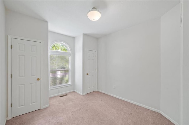 7633 W 148th Ter, Overland Park, KS 66223 - spare room with carpet and baseboards