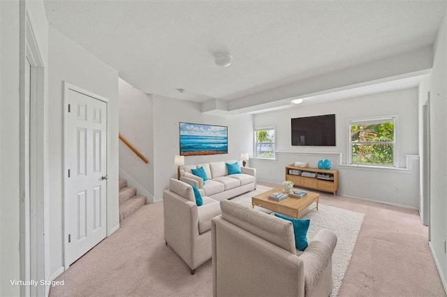 7633 W 148th Ter, Overland Park, KS 66223 - living room with light colored carpet and stairway