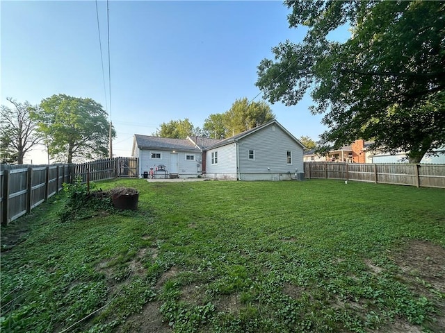 8719 E 57th St, Raytown, MO 64129 - back of property with a fenced backyard