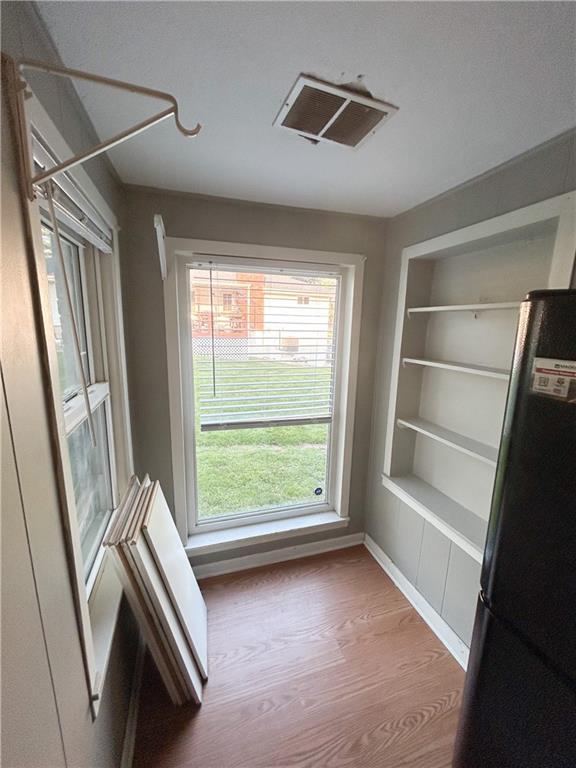 8719 E 57th St, Raytown, MO 64129 - view of unfurnished sunroom