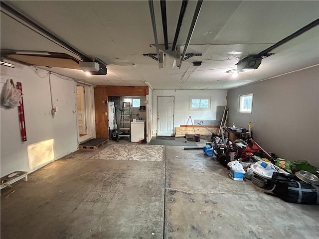 8719 E 57th St, Raytown, MO 64129 - garage featuring a garage door opener