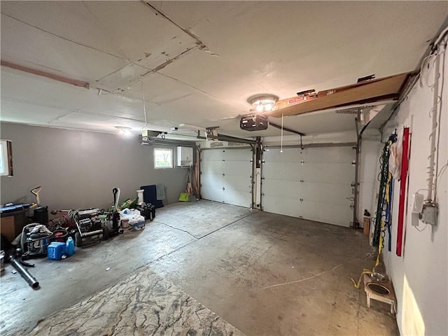 8719 E 57th St, Raytown, MO 64129 - garage with a garage door opener