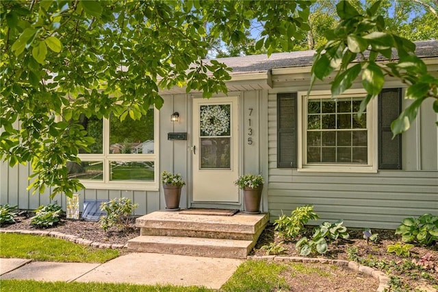 7135 Conser St, Overland Park, KS 66204 - view of exterior entry featuring board and batten siding