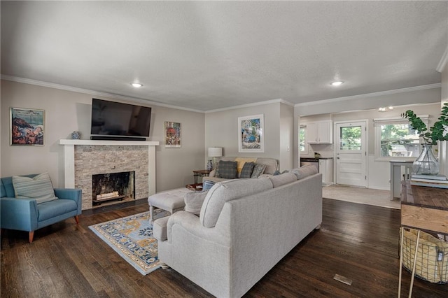 7135 Conser St, Overland Park, KS 66204 - living area with ornamental molding, wood finished floors, a fireplace, and recessed lighting
